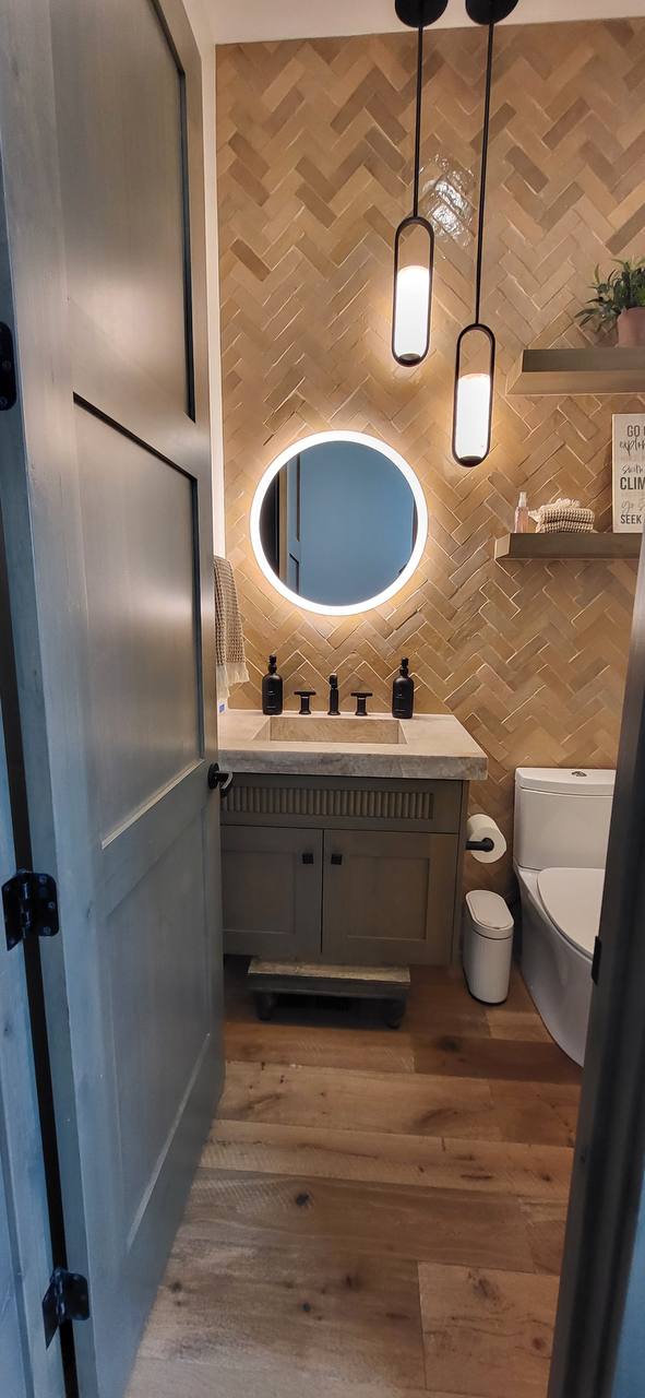 Herringbone tile powder room